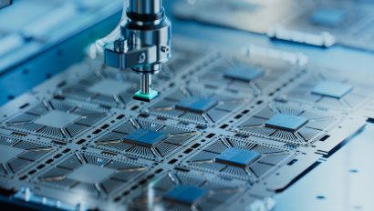 close-up-of-silicon-die-are-being-extracted-from-semiconductor-wafer-and-attached-to-substrate-by-pick-and-place-machine-computer-chip-manufacturing-at-fab-semiconductor-packaging-process